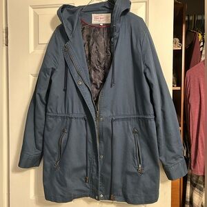 Blue utility Jacket with Hood and quilted interior.